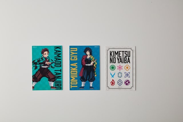 �u�b�N�^�̊ʃp�b�P�[�W�ɕt���̃|�X�g�J�[�h�i�S18��̂���3�����t���j